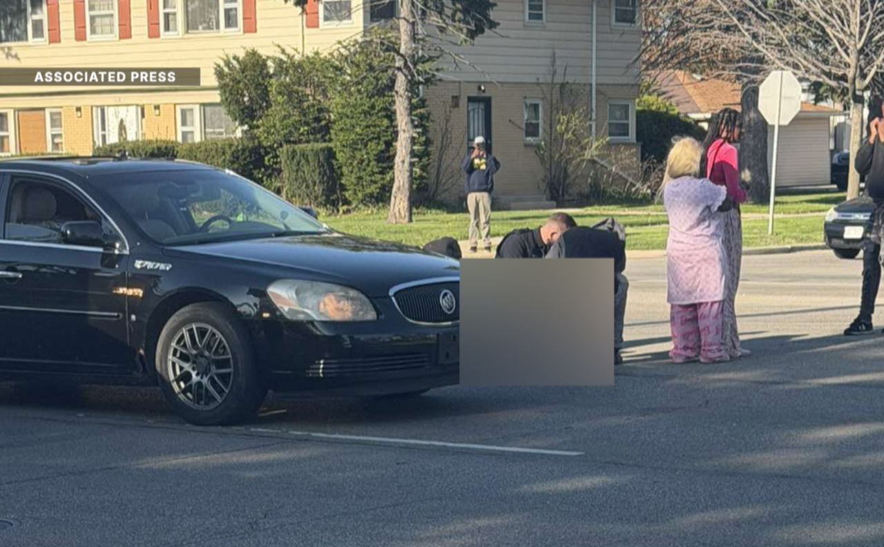 Sarah LaPalm captured this photo at the scene of officers rendering aid to the boy after she called 911