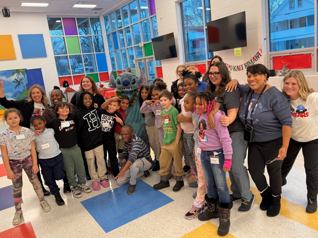 Disney's Stitch and students and teachers