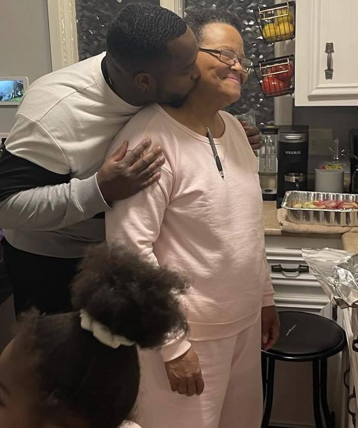 corder kissing grandmother.jpg