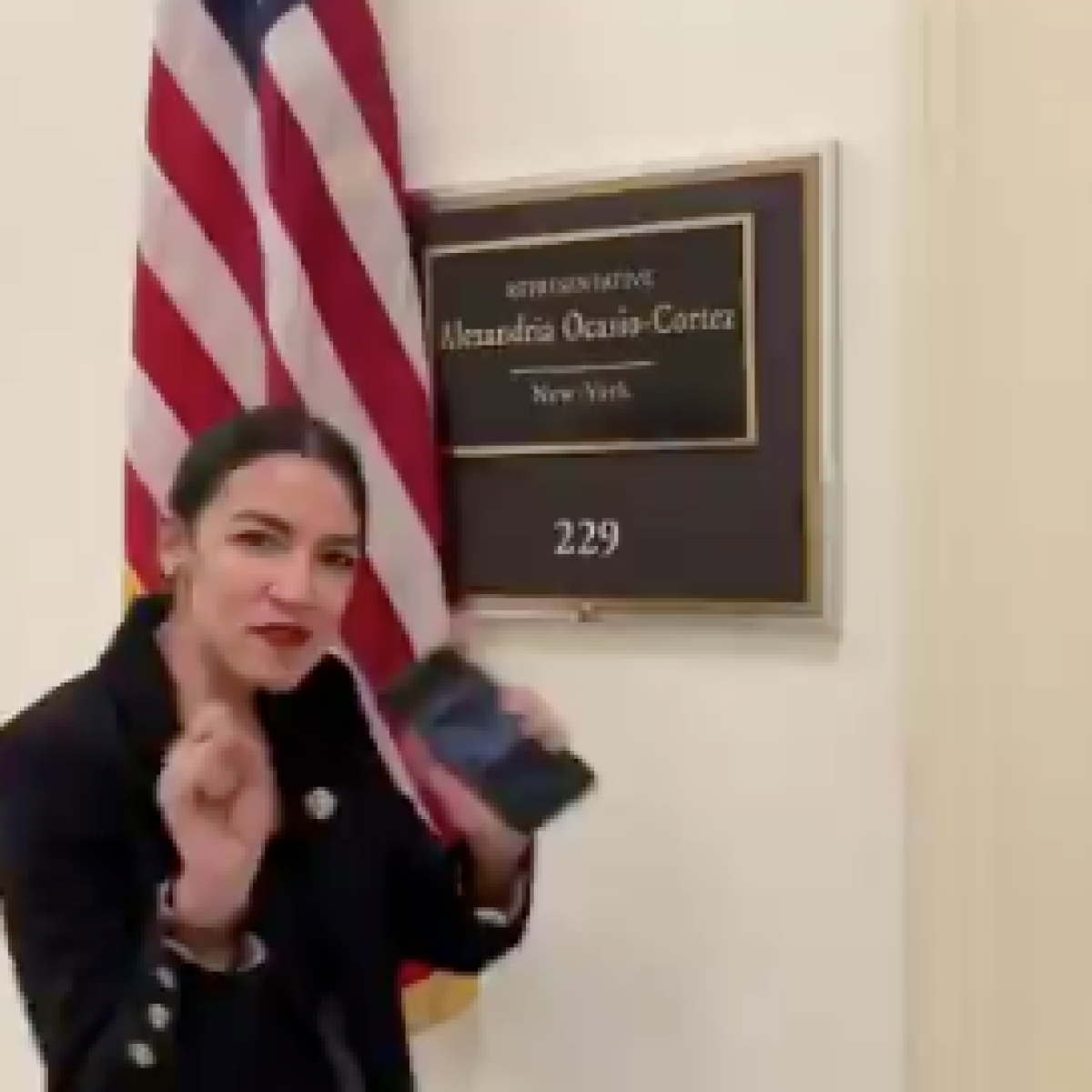Congresswoman Alexandria Ocasio-Cortez dances outside of Capitol Hill office in response to video