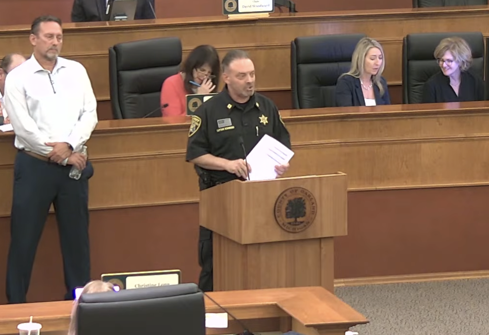 Captain Steve Schneider, Oakland County Sheriff's Chief Technology Officer, presenting information regarding Flock cameras and data in the county at the September 17 meeting
