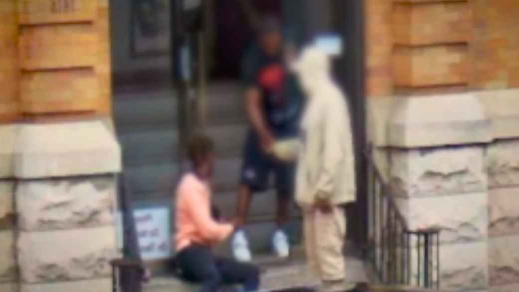 An apparent drug deal caught on video on the steps of the St. Francis Seraph friary in early July 2024.