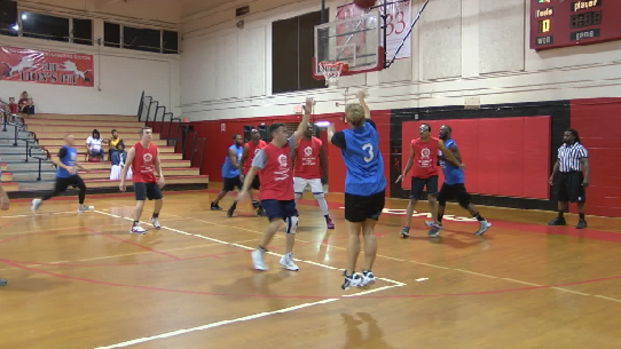Tallahassee Firefighters Police Officers Battle It Out On The Court