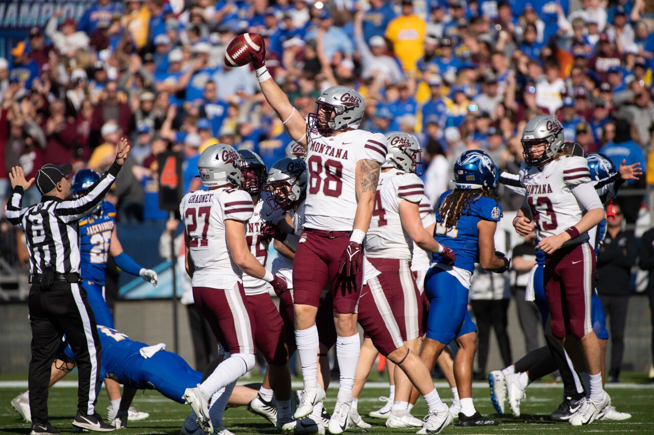 University of Montana junior Erik Barker (88) holds the ball high after a punt during the FCS national championship game at Toyota Stadium in Frisco, Texas on January 7, 2024.