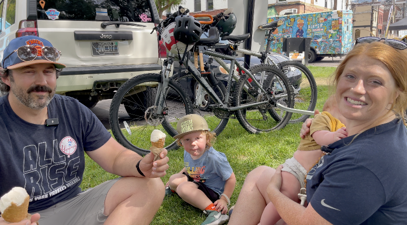 A pair of teachers stay cool with some ice cream along with their kids at River Roots Fest