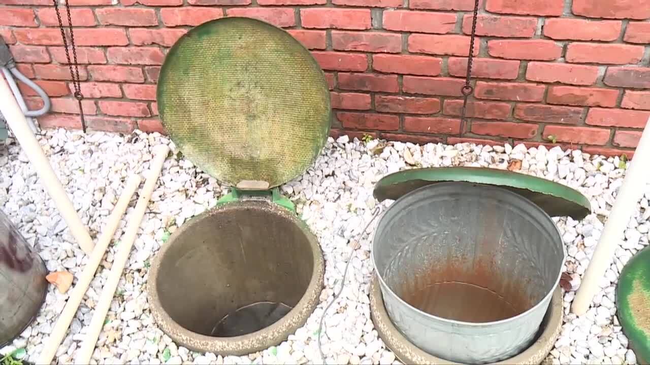water in Sylvia Macmenomay's in-ground trash system in Atlantis, March 3, 2024
