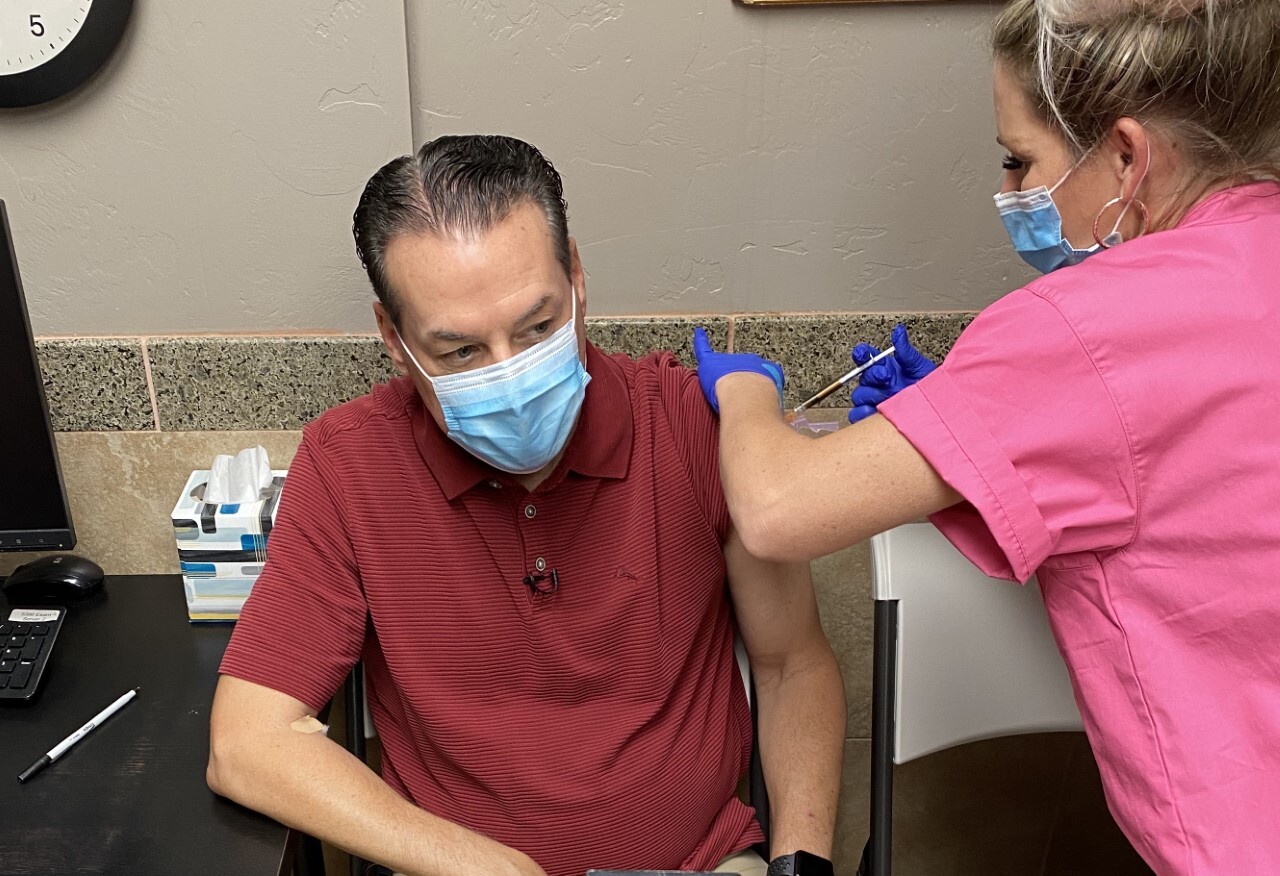 KGUN9 Anchor Pat Parris receives his second injection as part of a COVID-19 vaccine clinical trial in Tucson