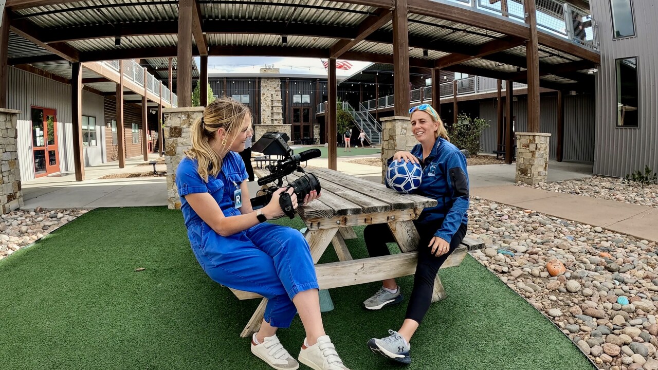 Perkin speaking with Denver7 Maggy Wolanske.jpg