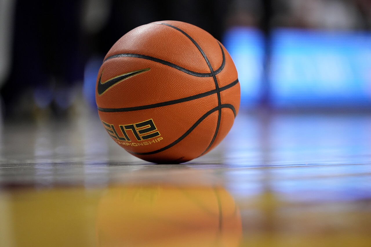 Basketball on court during men's game between Iowa State and Kansas State in 2023
