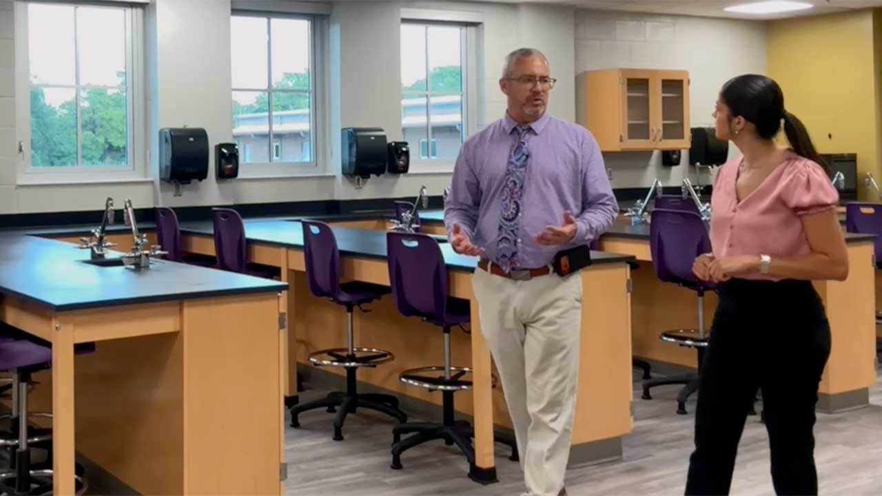 Superintendent Dylan Tedders gives WPTV reporter Cassandra Garcia a tour of the new Okeechobee County High School. 