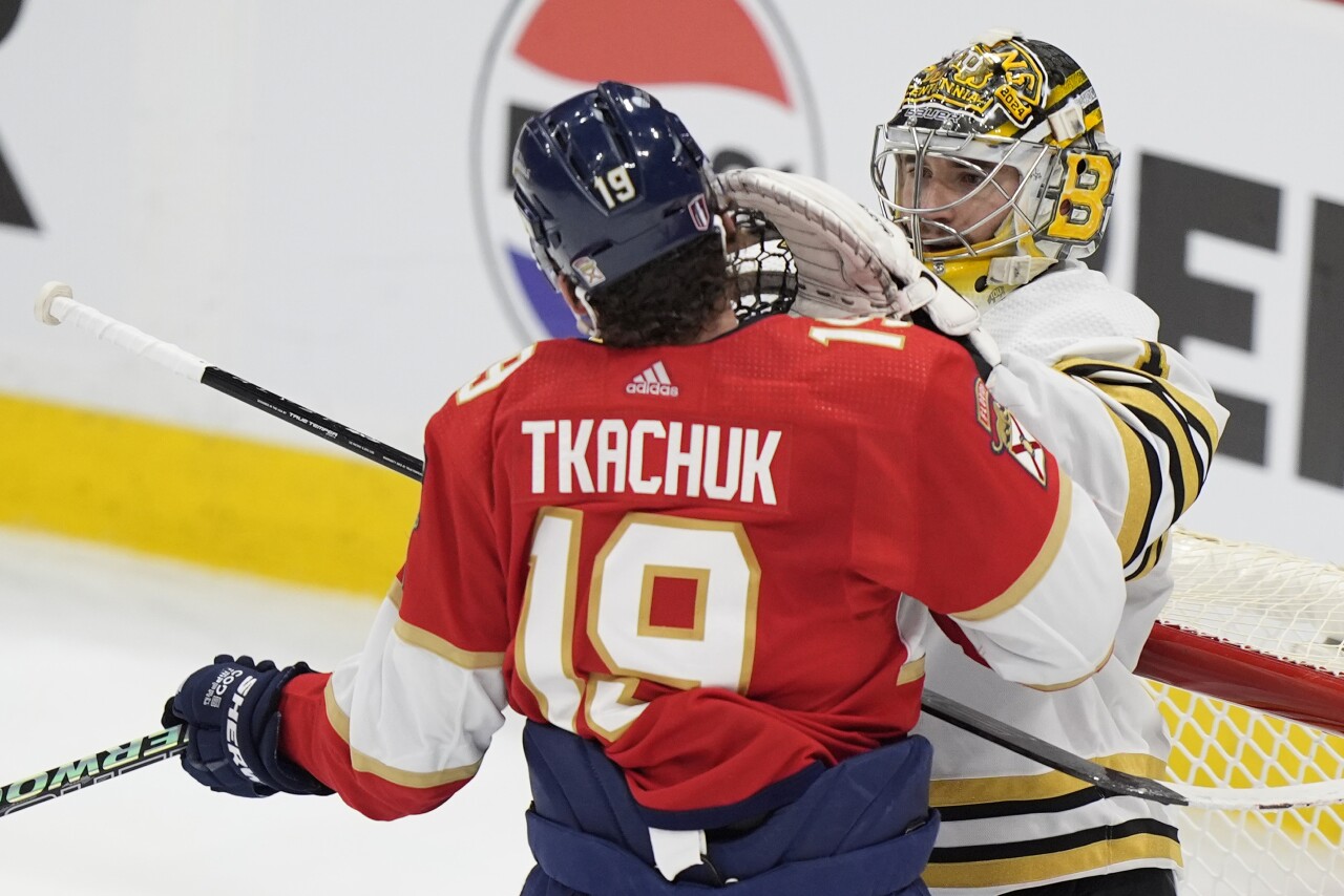 Florida Panthers left wing Matthew Tkachuk and Boston Bruins goaltender Jeremy Swayman scuffle during second period of opening game of playoff series, May 6, 2024