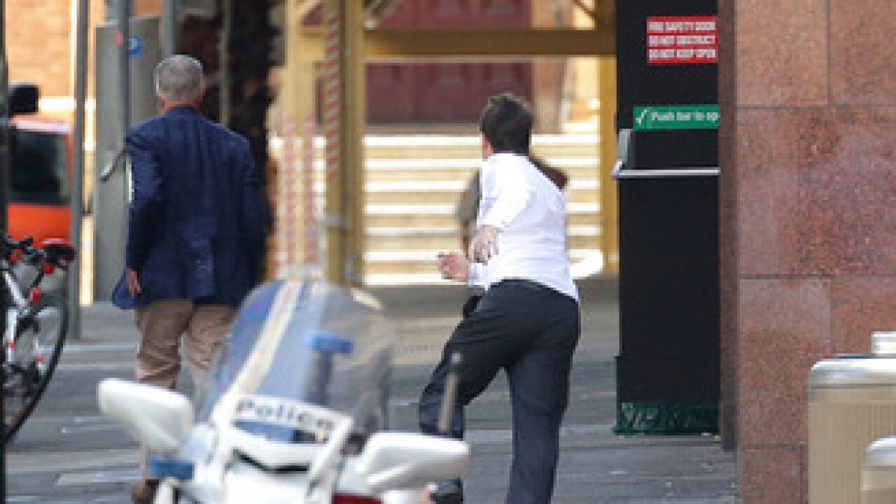 PICS: Standoff at Sydney cafe