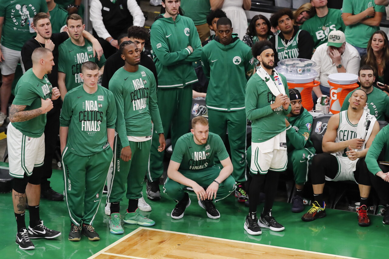 Dejected Boston Celtics players watch in final minutes of Game 6 of 2022 NBA Finals