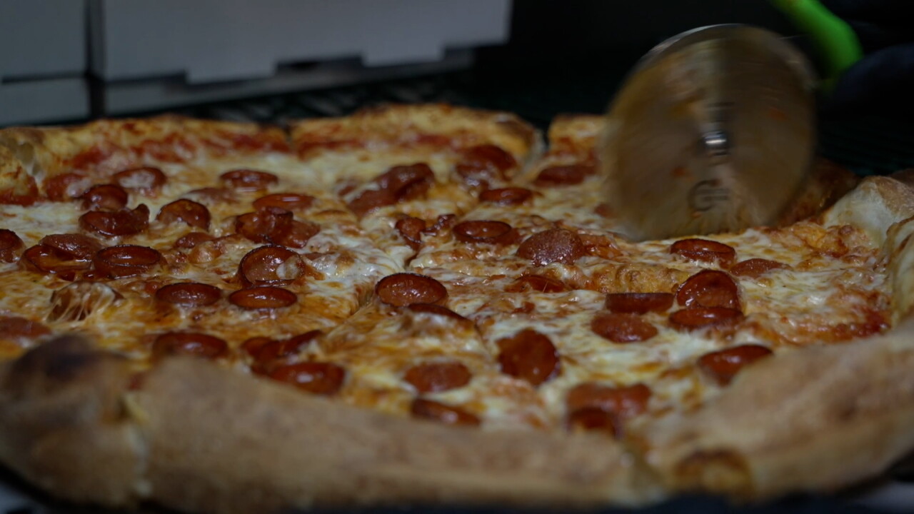cutting pizza.jpg
