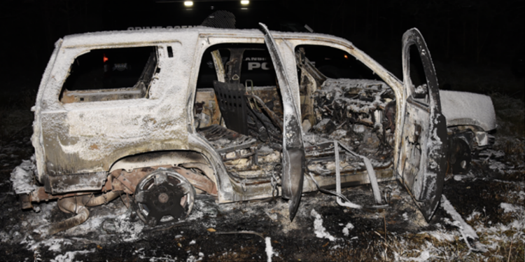 burned car in accidental shooting death of Lansing 2-year-old