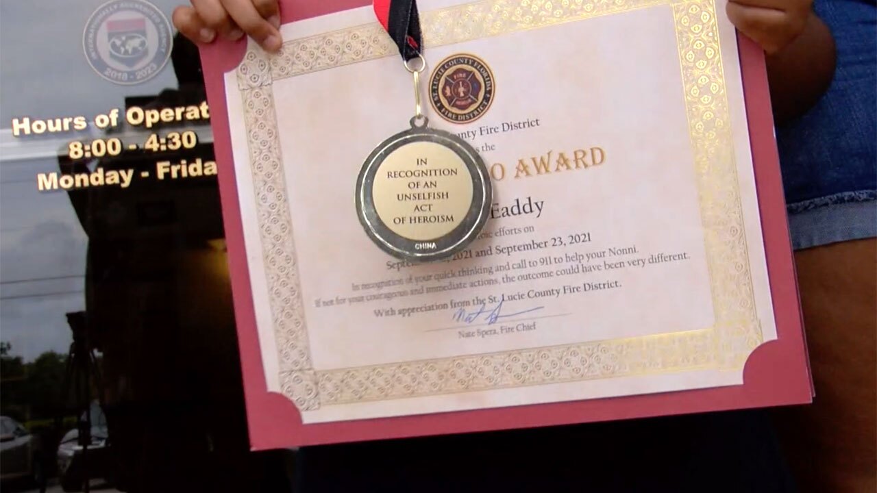 Ma’Zari Eaddy shows off her Citizen Hero Award