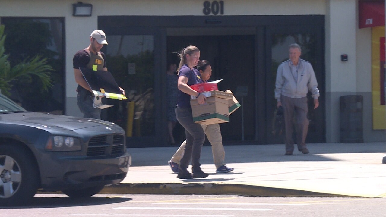 Feds2.jpgFederal agents execute a search warrant at 801 W. Bay in Largo