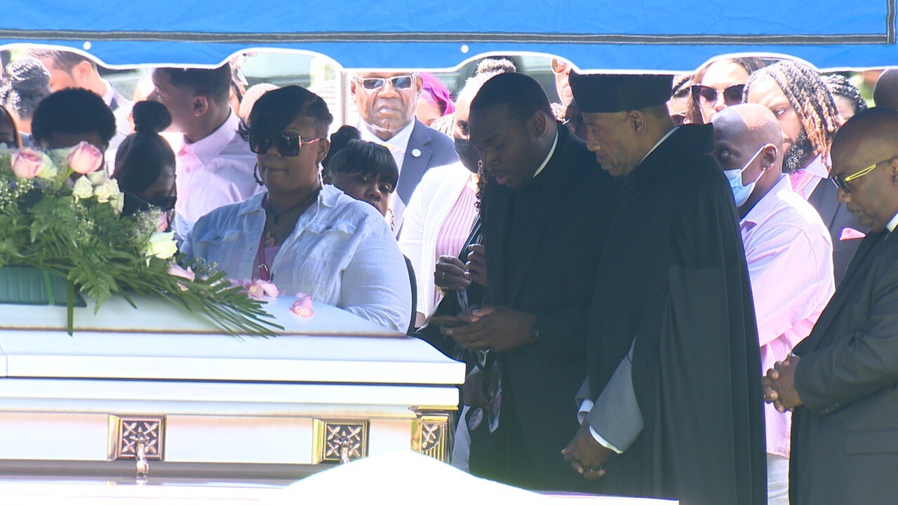 prayers at casket .jpg