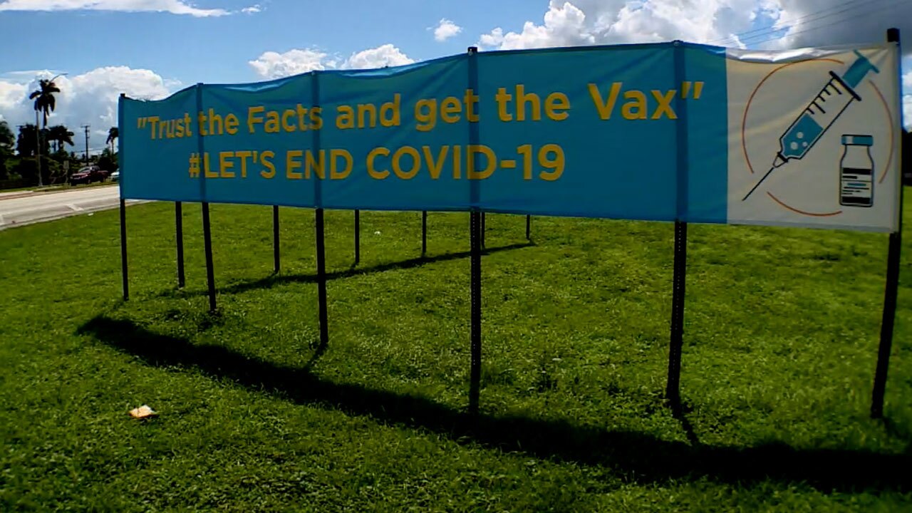 Sign around Belle Glade urging people to get vaccine