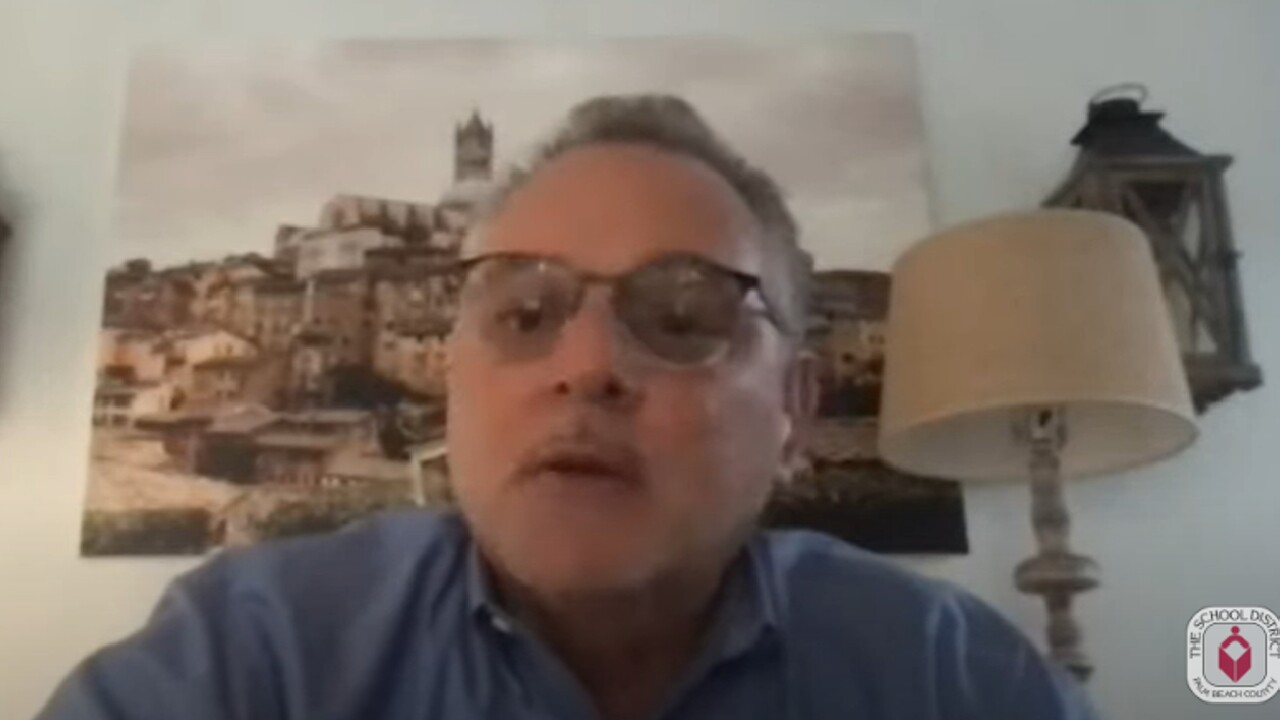 Dr. Peter Licata speaks at a community informational meeting on April 19, 2022.jpg