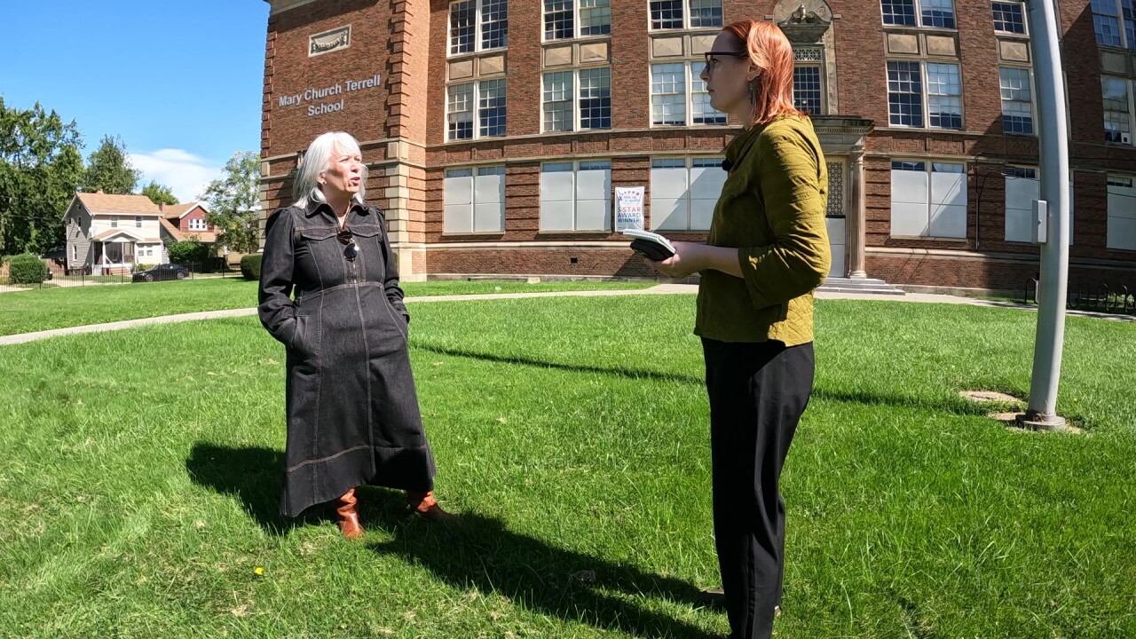 Real estate developer Melissa Ferchill Swingos, left, talks to News 5 reporter Michelle Jarboe about a preservation proposal for the former Mary Church Terrell school on Cleveland's West Side.