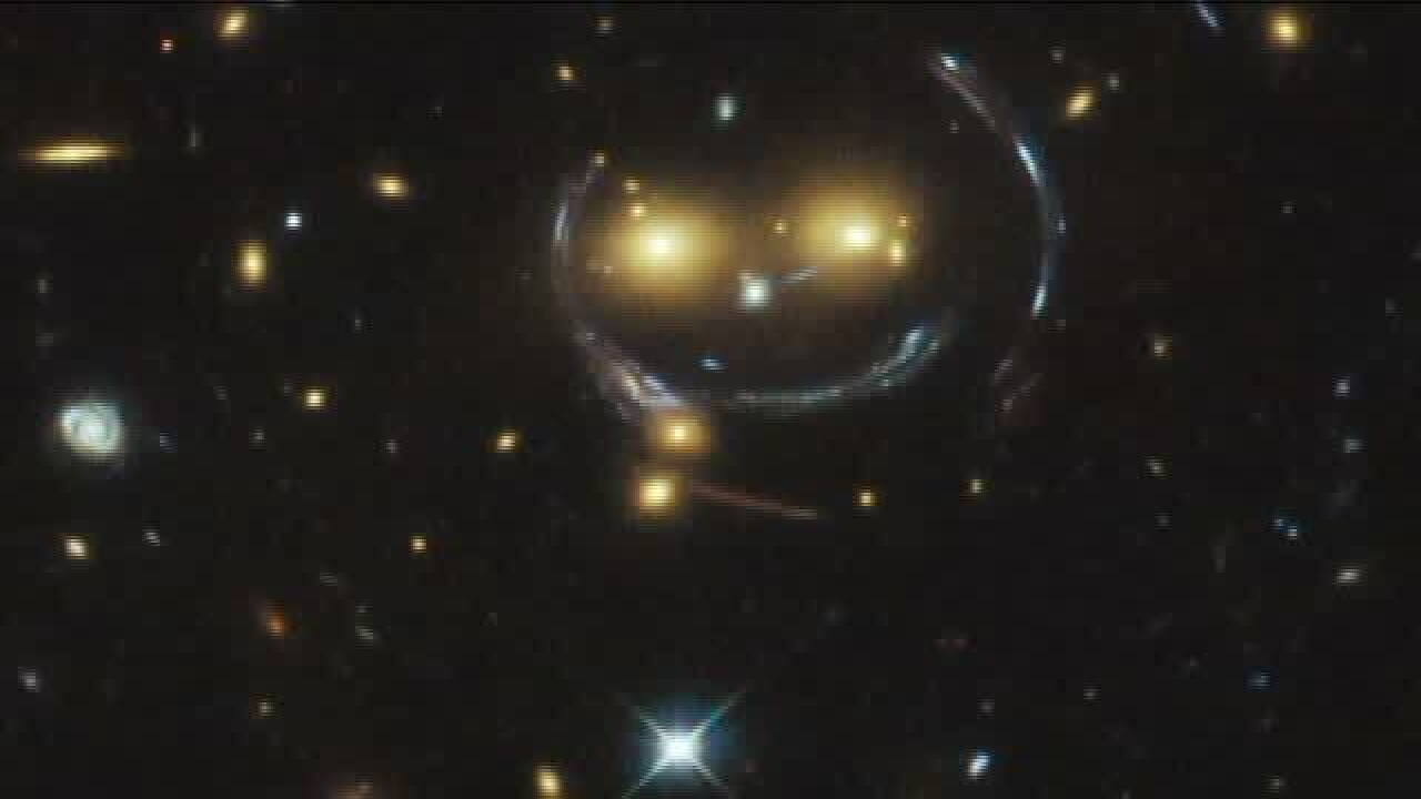 Hubble Face Hubble telescope spots 'smiley face' galaxies