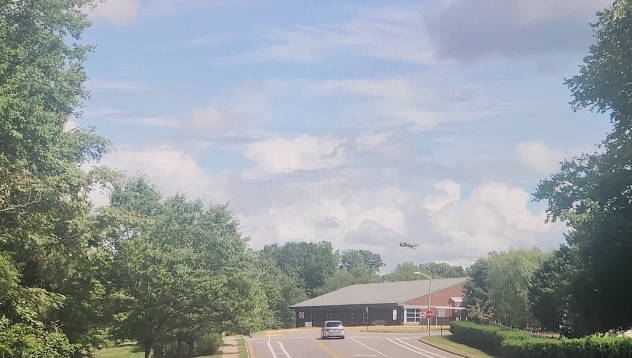 Plane over Rivers Edge.png