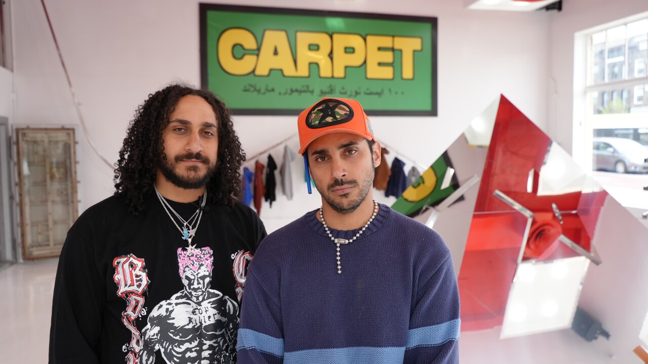 Brothers Ayman and Osama in their new store