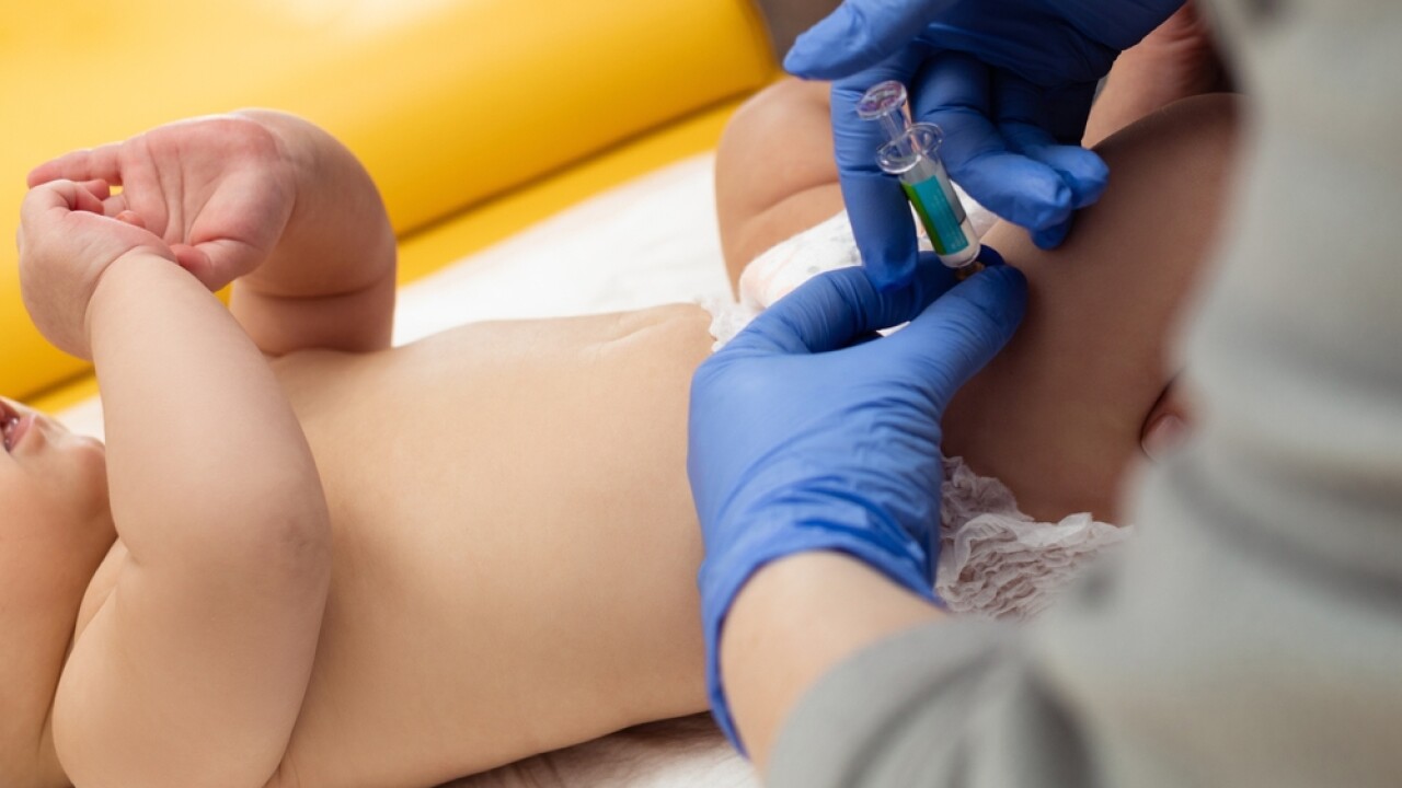 Pediatrician administering a vaccination