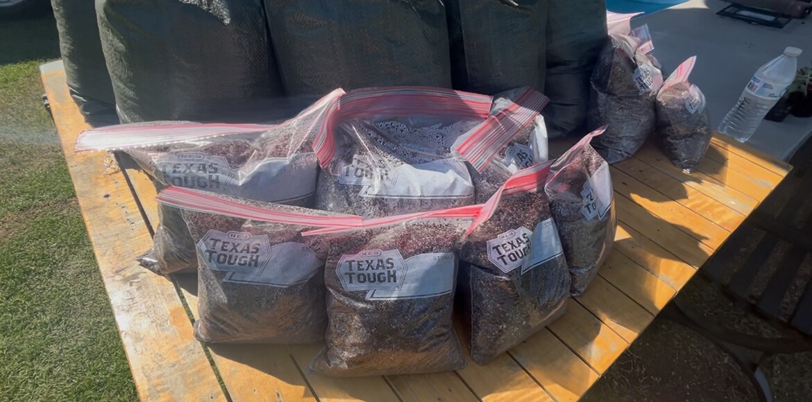 Photo by: Jessica Poole

Bagged soil mix and Succs N Such.