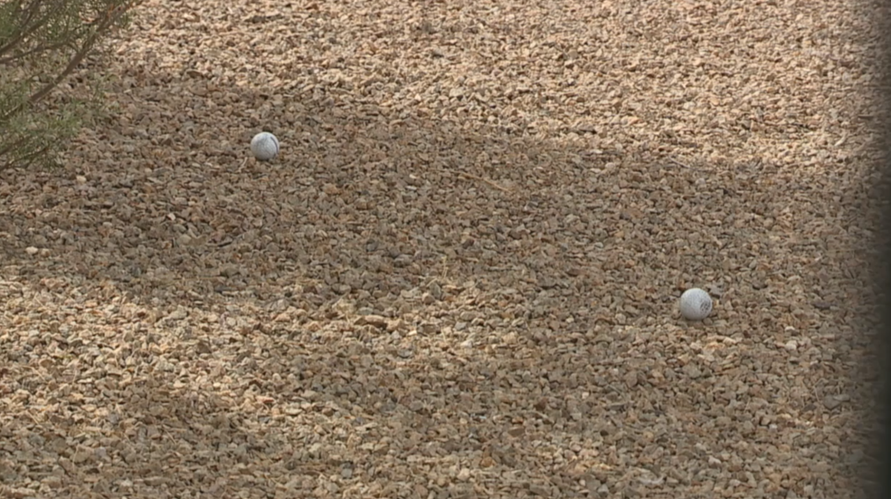 Residents near Atomic Golf say stray balls are 'bouncing off of cars'