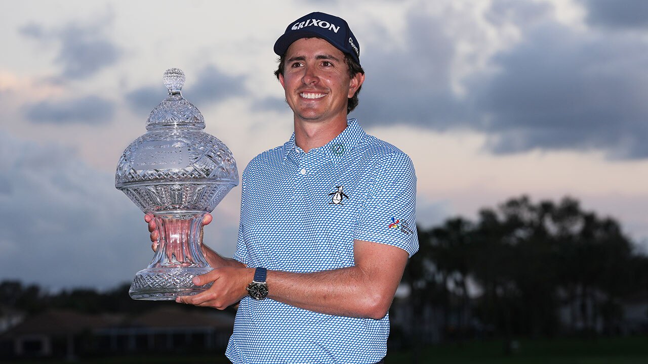 Nico Echavarria of Colombia holds the Cognizant Classic Trophy at the end of the final round of the Cognizant Classic golf tournament, Sunday, March 1, 2026, in Palm Beach Gardens, Fla.