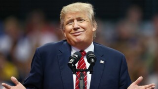 Republican presidential candidate Donald Trump speaks during a campaign rally at the American Airlines Center on September 14, 2015 in Dallas, Texas.