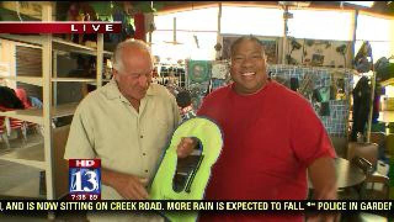 Budah checks out snorkel and scuba gear