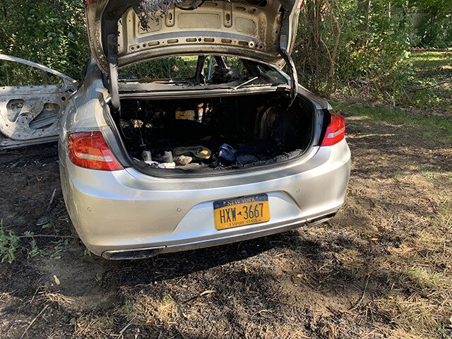 2 bodies found in burning car identified