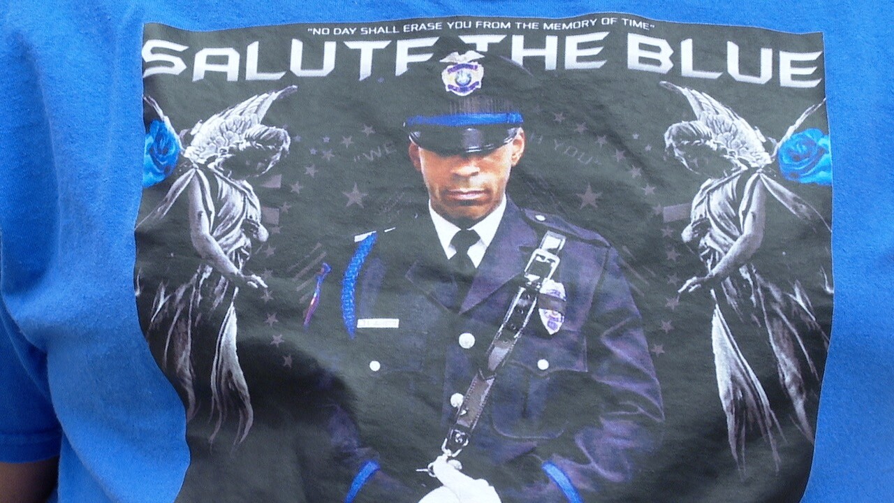Desmond Joseph wearing a shirt in honor of his cousin