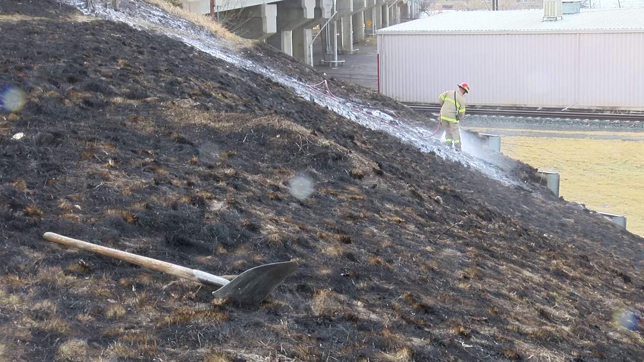 Crews tackle grass fire along 10th Avenue South