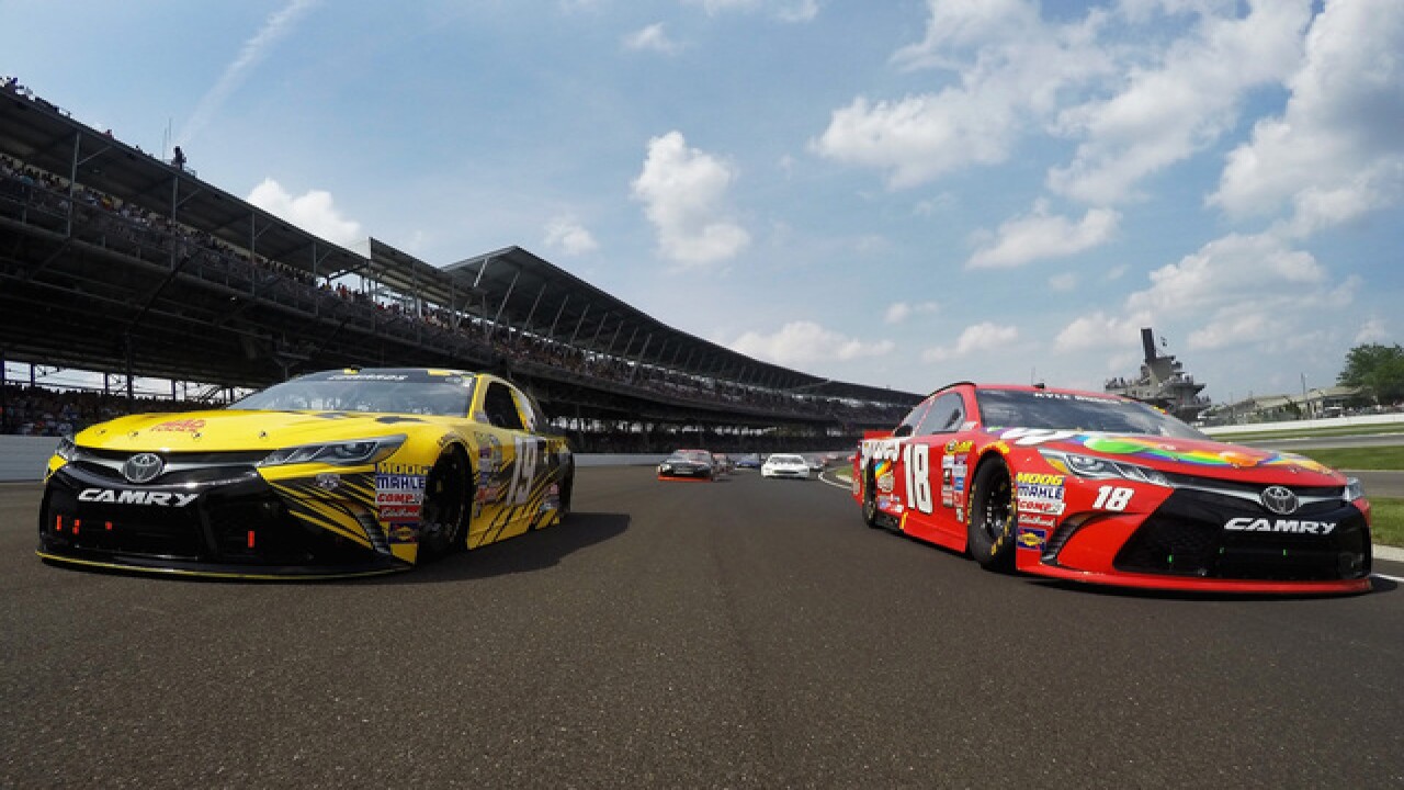 PHOTOS: Busch leads most of Brickyard to win