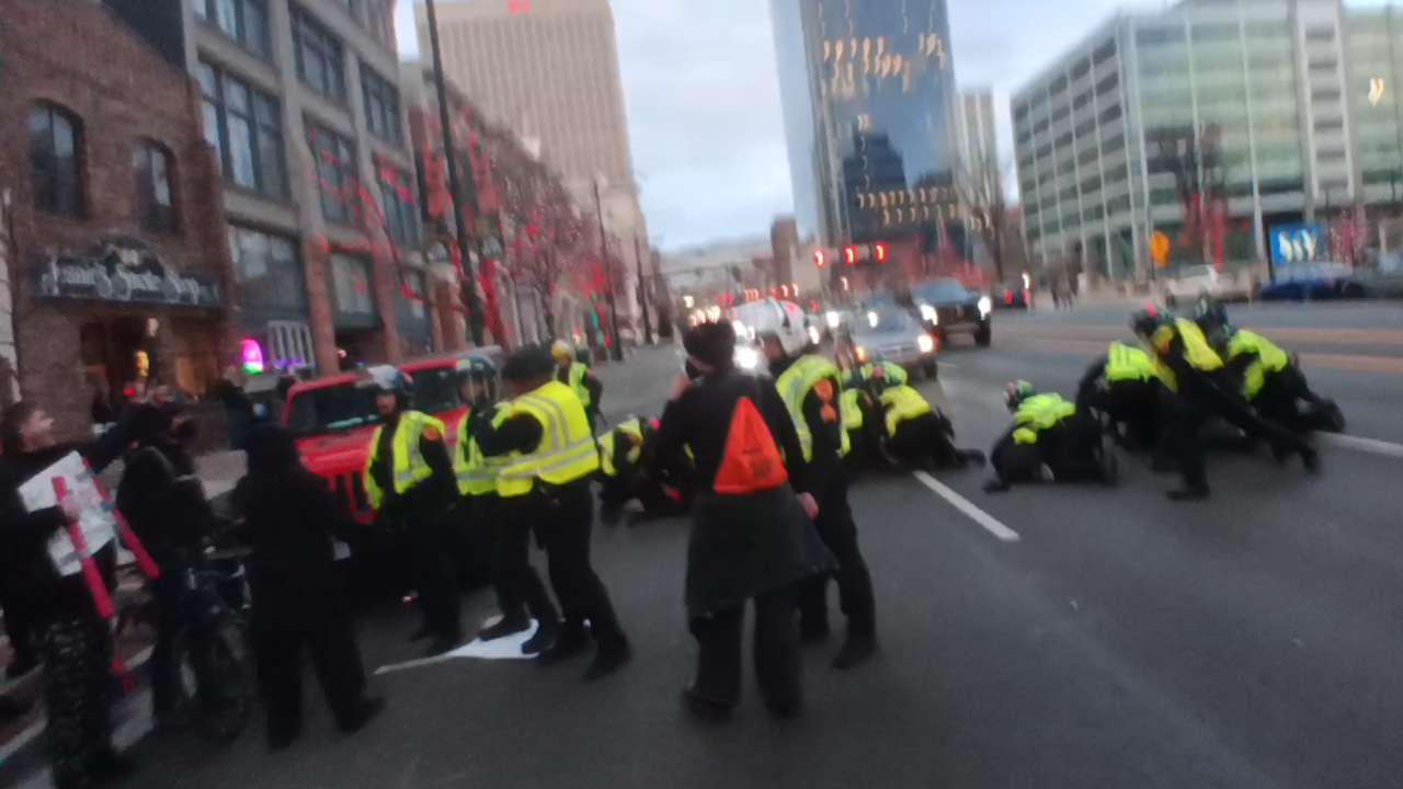 Four protestors were arrested after blocking downtown State Street, police say