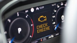 A check engine light on a car.
