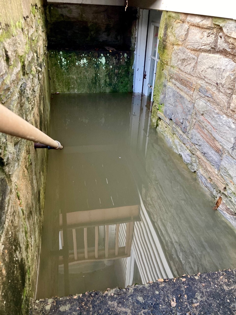 Flooded stairs leading to basement