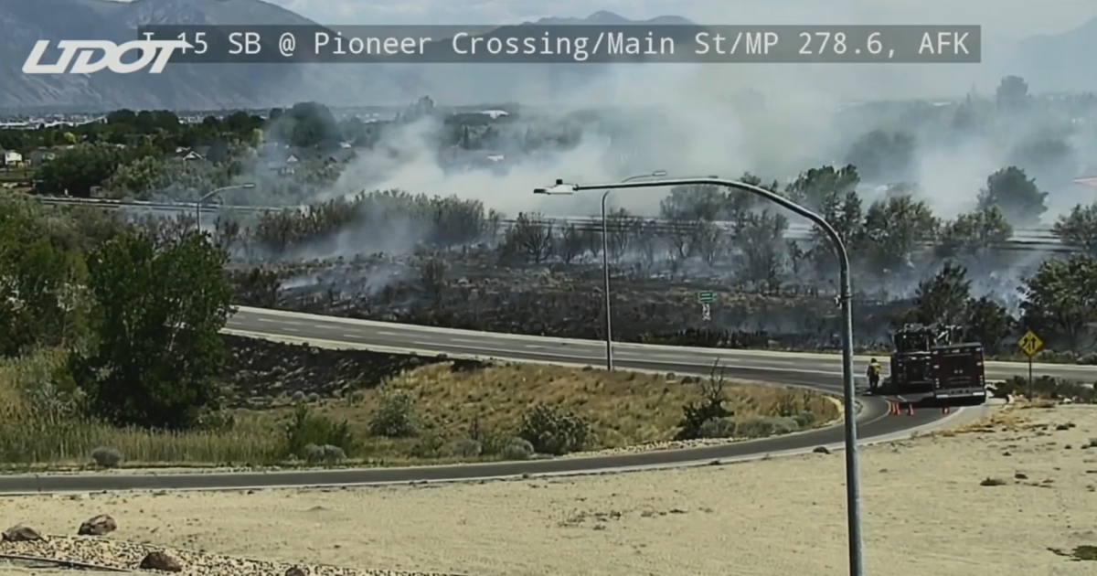 Brush fire burning along I-15 in Utah County