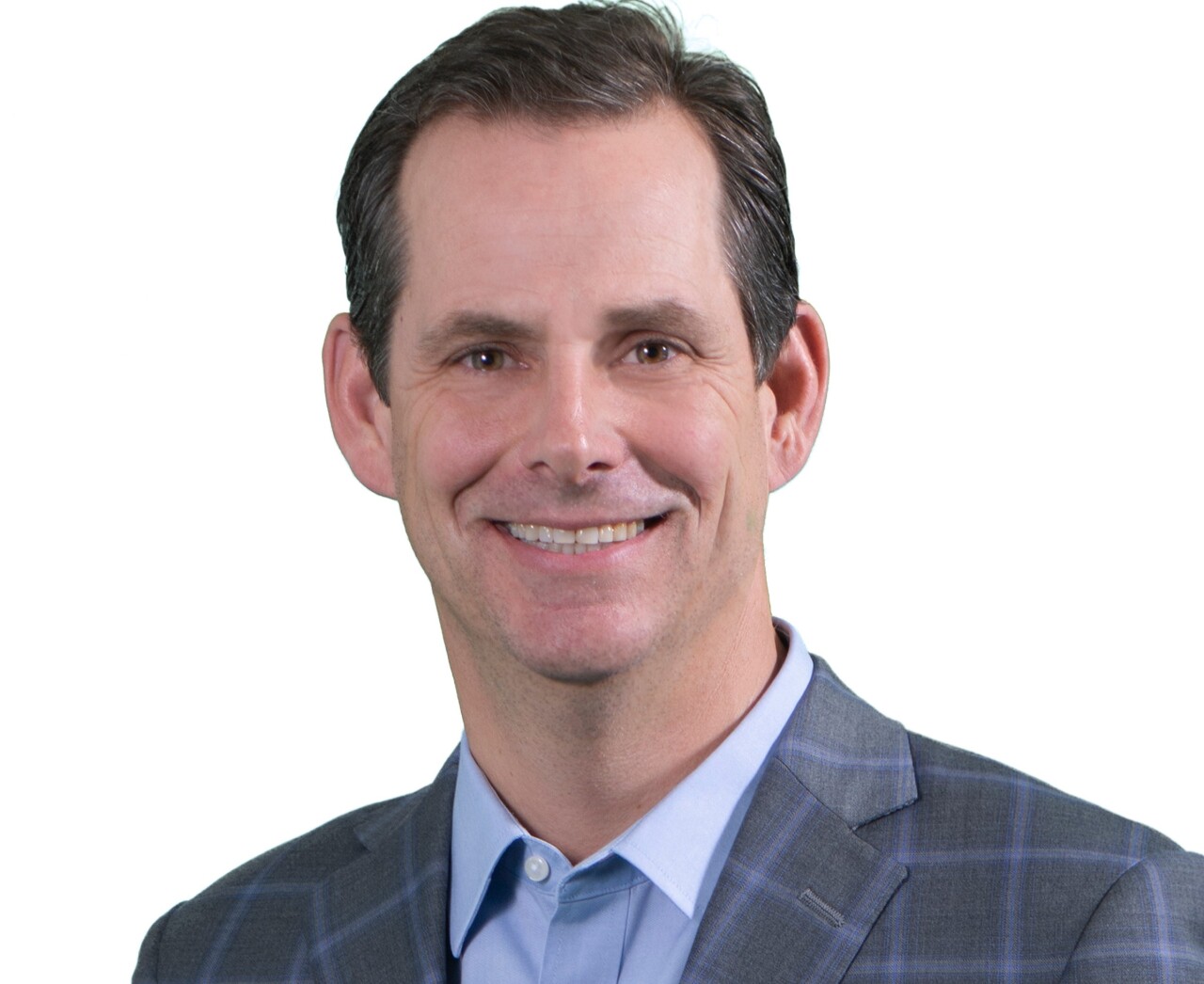Lee Crume is the president and CEO of Northern Kentucky Tri-ED. He's wearing a blue dress shirt and a grey blazer with a blue pattern.