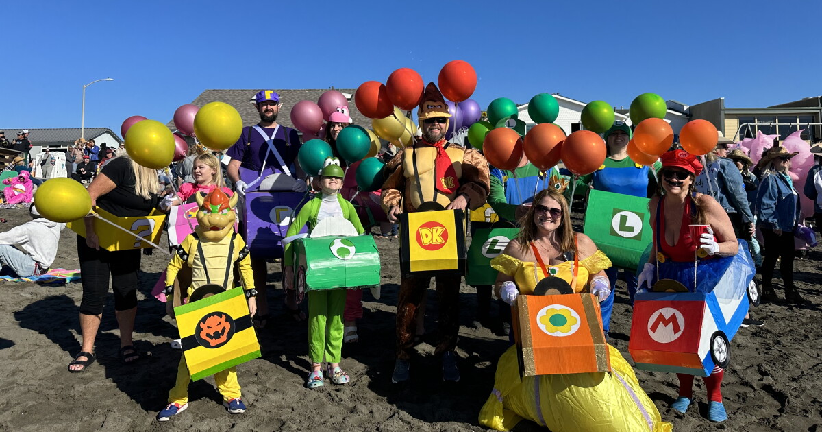 Thousands take a dip in the cold Pacific to celebrate New Year’s Day