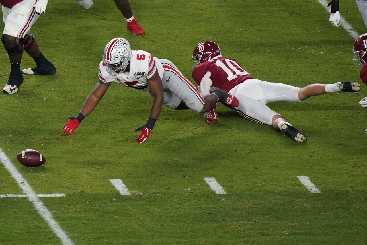 Ohio State Buckeyes linebacker Baron Browning recovers fumble by Alabama Crimson Tide QB Mac Jones in second quarter of 2020 College Football Playoff National Championship