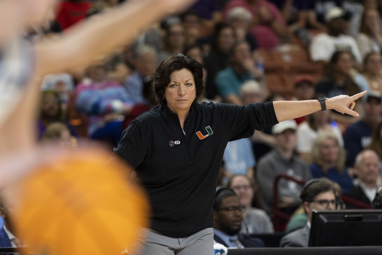 Miami Hurricanes women's basketball coach Katie Meier on sideline during second half of Sweet 16 game of NCAA tournament, March 24, 2023