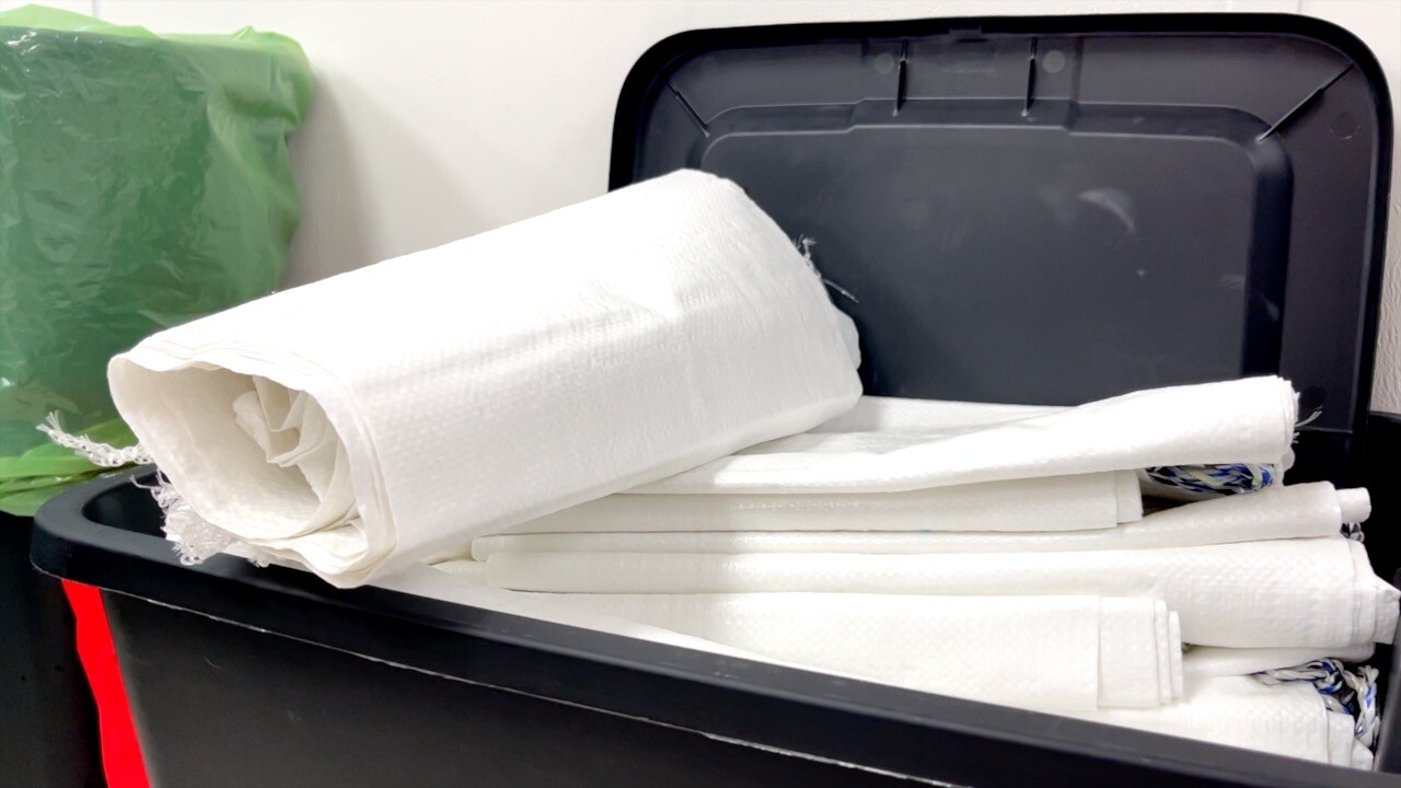 Bin of sandbags ready to be distributed at the Fort Myers Beach Town Hall.