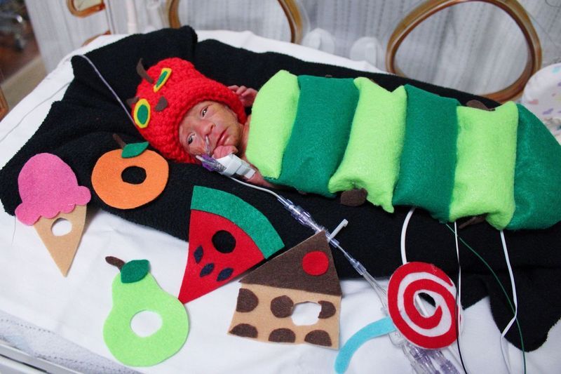 Baby in Very Hungry Caterpiller costume - Trinity Health Grand Rapids NICU.png
