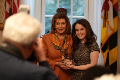 Nancy Pelosi with her mother's Hall of Fame award