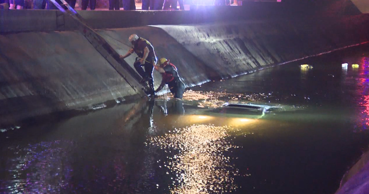 Firefighters rescue man after car plunges into canal in west Phoenix